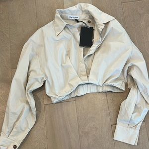 En Saison brand. Never worn collared crop top. Long sleeve.